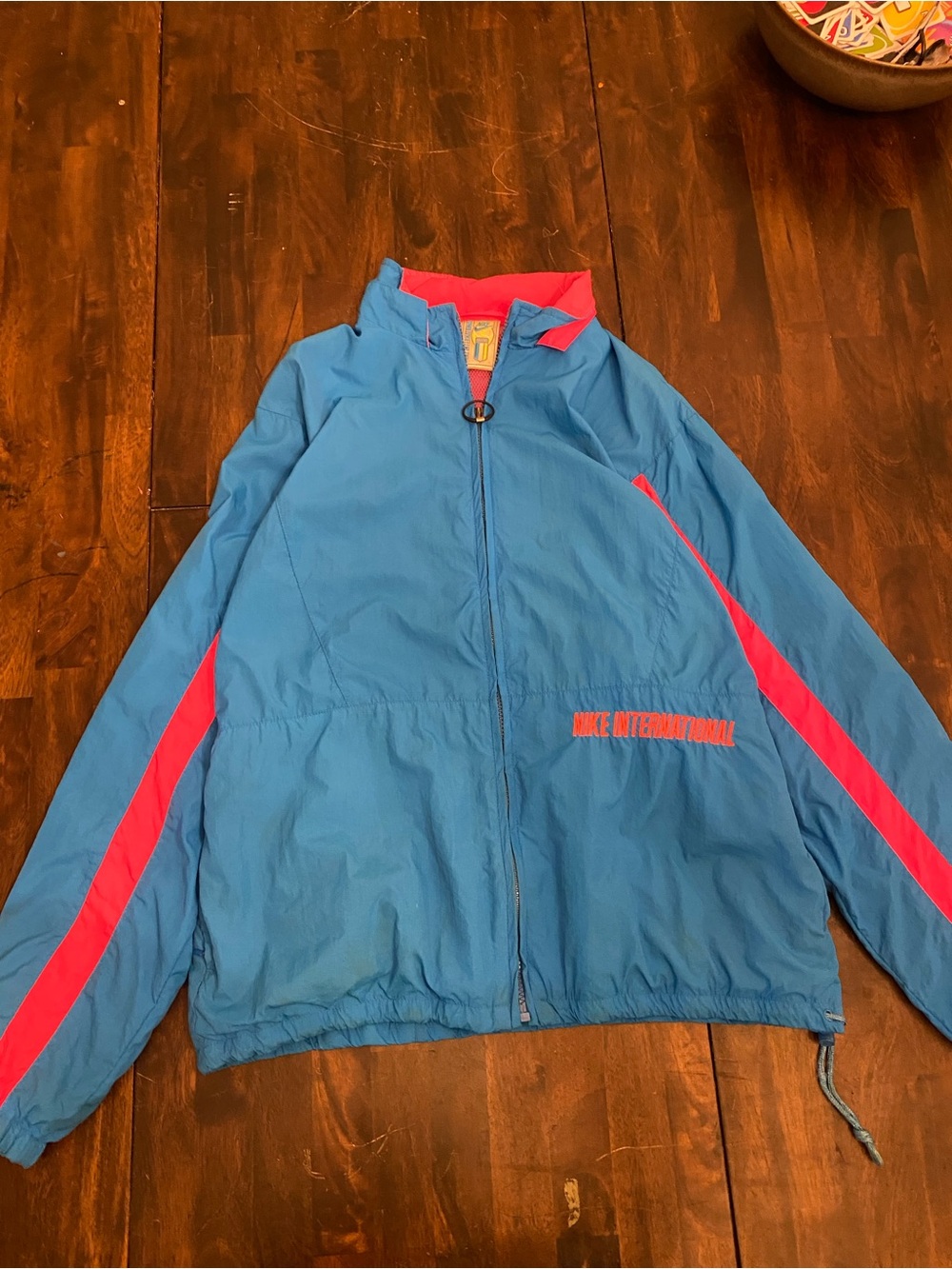 Nike men’s Blue Jacket with Pink Accent Stripes